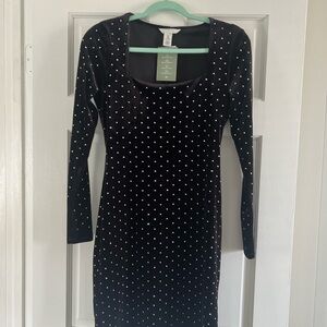 Black and white polka dot dress with full length sleeves